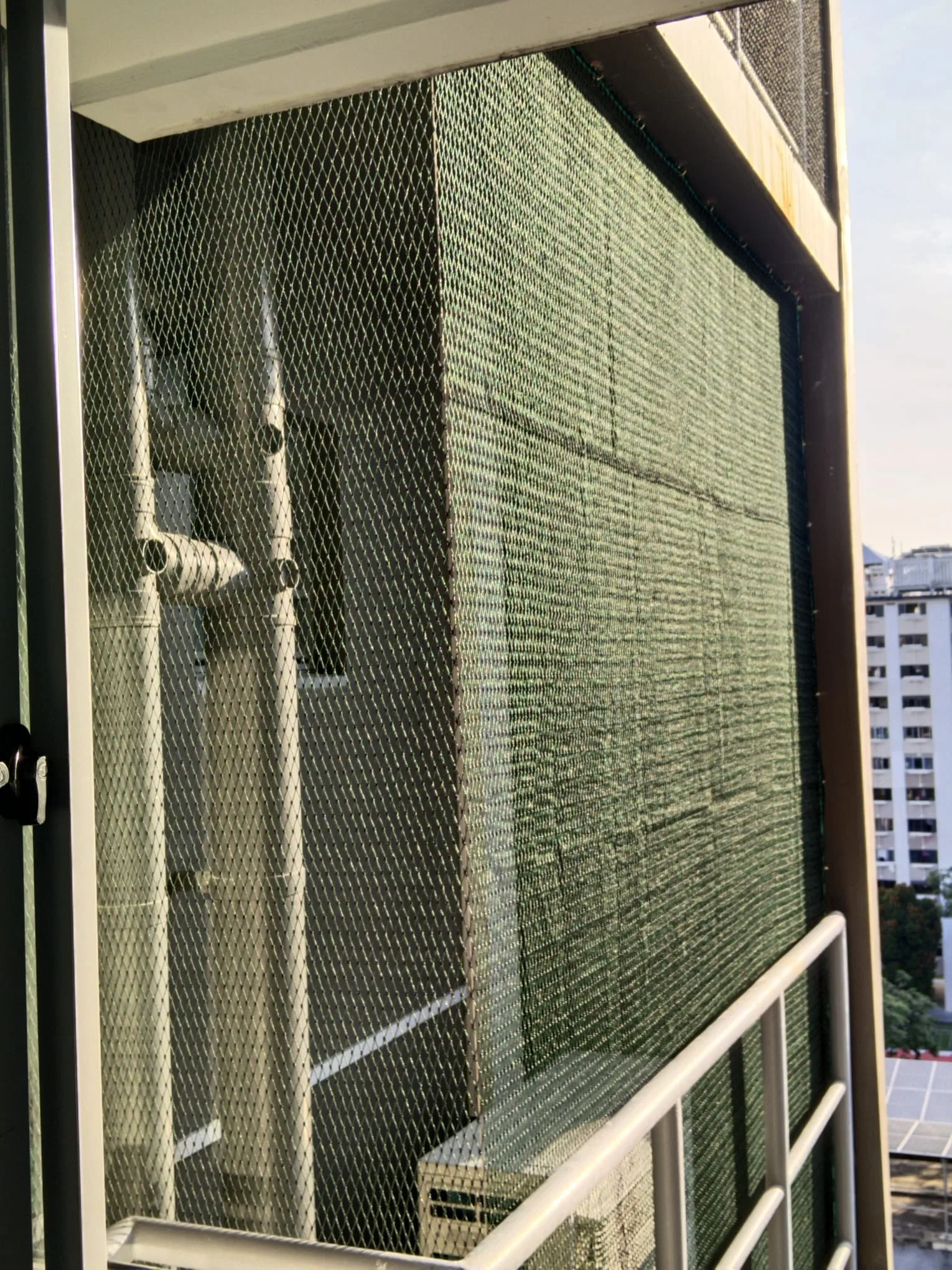 Completed aircon ledge netting installation Singapore