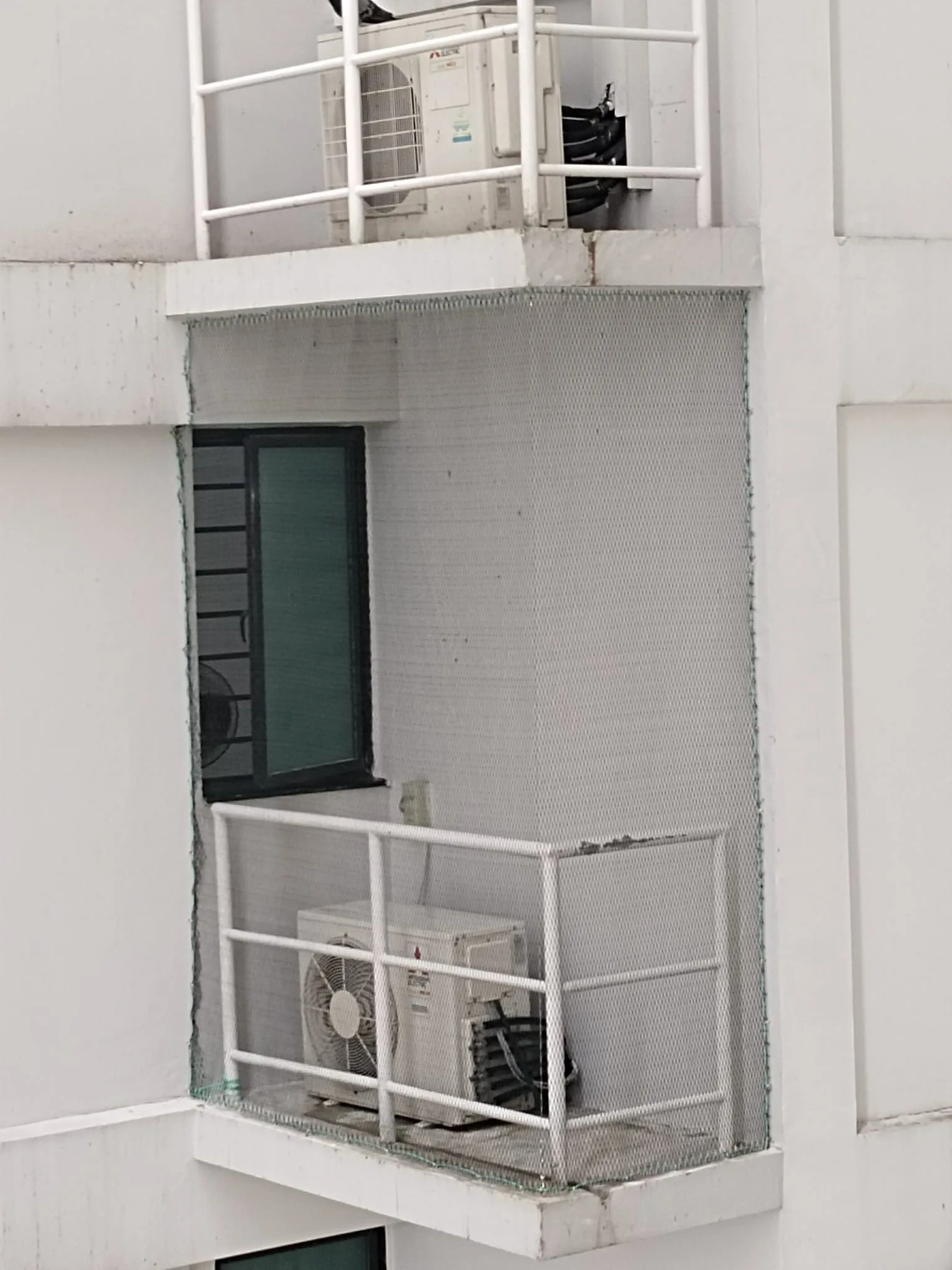 Bird netting installed on aircon ledge Singapore