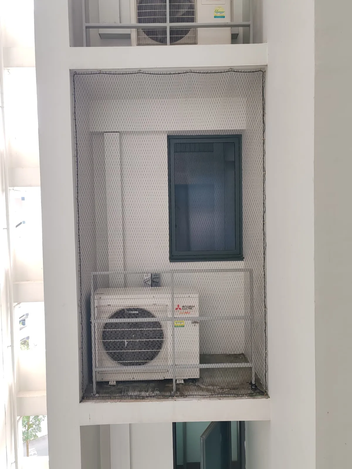 Completed aircon ledge netting Singapore flat